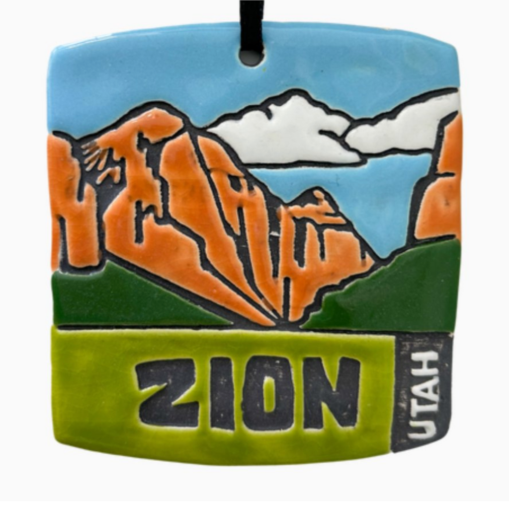 Ceramic ornament featuring the red rocks of Zion National Park. 