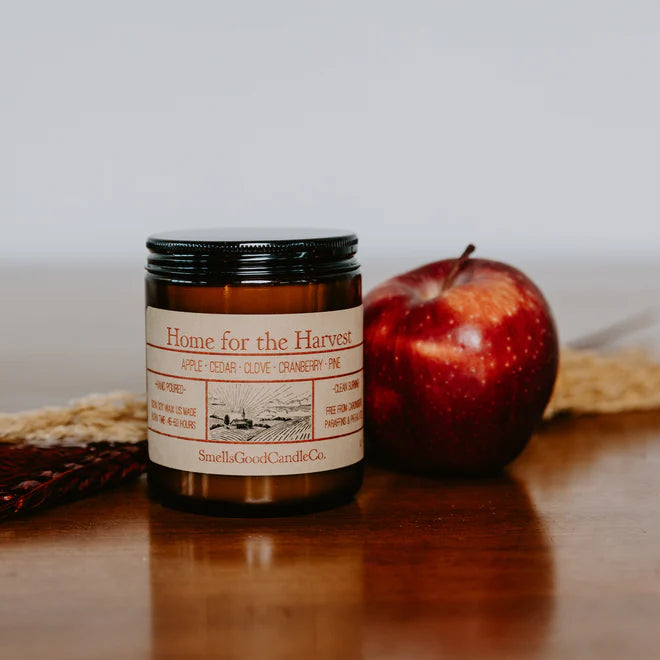 Bring the heartwarming spirit of the harvest season into your home with our "Home for the Harvest" Candle. This handcrafted candle is a fragrant tribute to the joys of autumn, inviting you to savor the comforting scents of the season.&nbsp;The crisp sweetness of apple pairs harmoniously with the warming spices of cinnamon, clove, and ginger, creating a delightful aroma that wraps you in the coziness of a fall day.