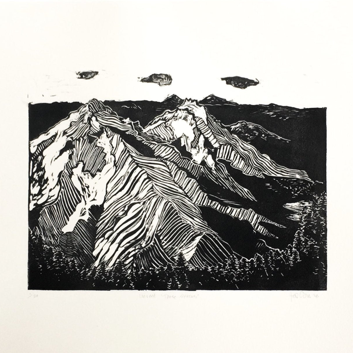 hand carved and pressed black and white 11x14 print of the Three Sisters mountain range