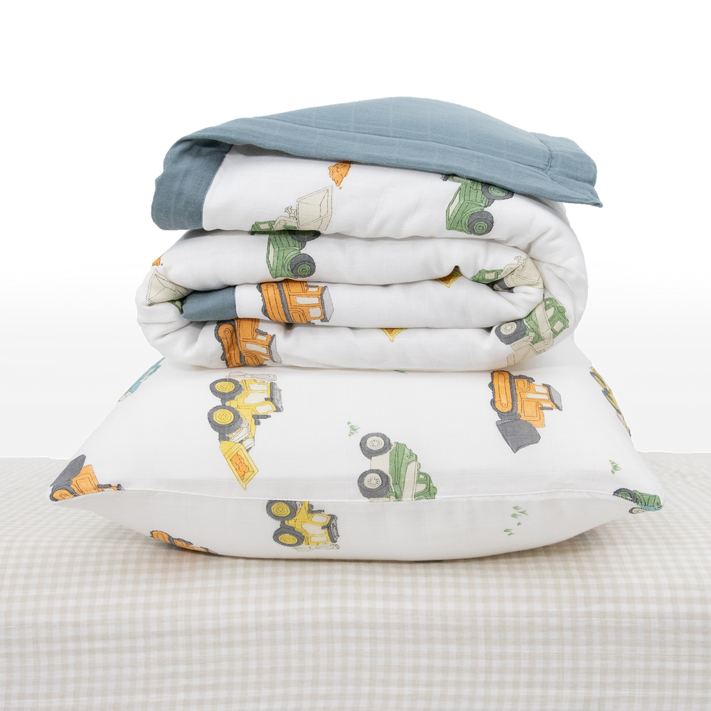 Celebrate their imagination. The Toddler Bedding Set features a variety of themes and prints to help bring their creativity to life as they transition from infant to toddler. 3 piece set includes: 1 Toddler Comforter, 1 crib sheet, 1 pillowcase.  Cotton Muslin Toddler Bedding 3 Piece Set - Work Trucks