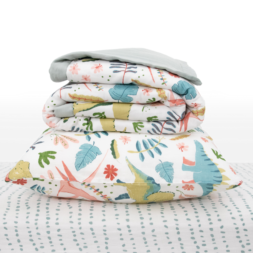 Celebrate their imagination. The Toddler Bedding Set features a variety of themes and prints to help bring their creativity to life as they transition from infant to toddler. 3 piece set includes: 1 Toddler Comforter, 1 crib sheet, 1 pillowcase. Cotton Muslin Toddler Bedding 3 Piece Set - Boho Dino 