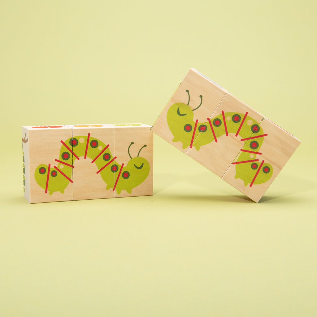 This floral frenzy is busting out with fun! Build your own garden scene. Six blocks feature tulips, colorful flowers, caterpillars, a butterfly, and more. Can you count the petals? How will you measure the inchworm with the ruler? More than colorful educational blocks, this artful set is a decorative puzzle, too. It’s blooming beautiful!  6 - 3 x 1.75 inch blocks