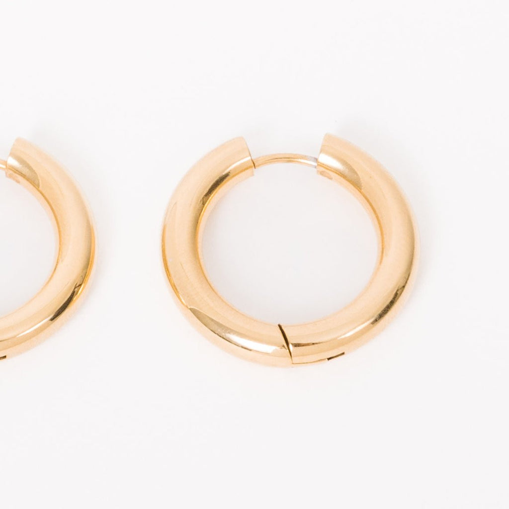 90's Huggies   You know what was the comeback we never knew we needed?&nbsp; The 90s!&nbsp; With bold, chunky styles, baggy jeans, and hoops all up and down the ear, 90s were a decade never afraid of being too much!&nbsp; And now we've got the perfect hoop to match the vibe!