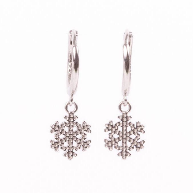 silver huggies with dangling snowflake charms