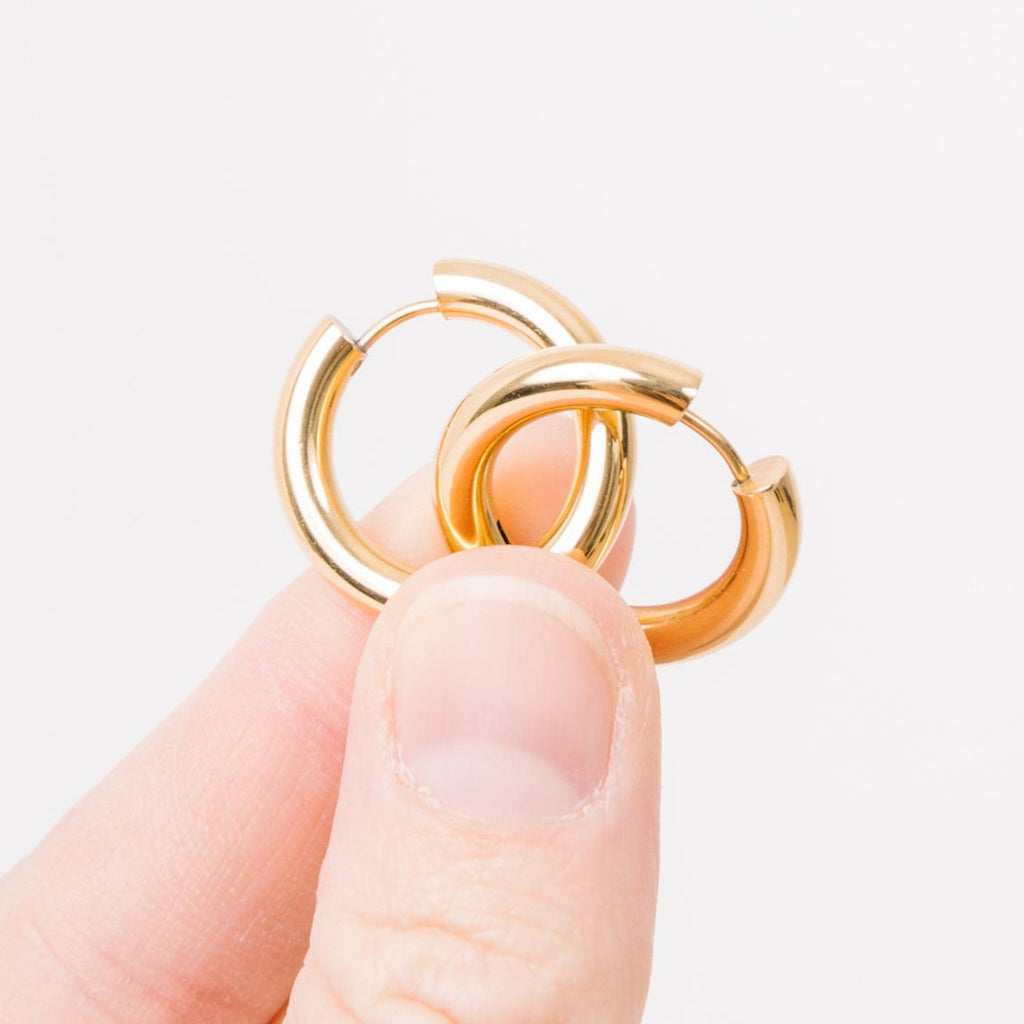 90's Huggies   You know what was the comeback we never knew we needed?&nbsp; The 90s!&nbsp; With bold, chunky styles, baggy jeans, and hoops all up and down the ear, 90s were a decade never afraid of being too much!&nbsp; And now we've got the perfect hoop to match the vibe!