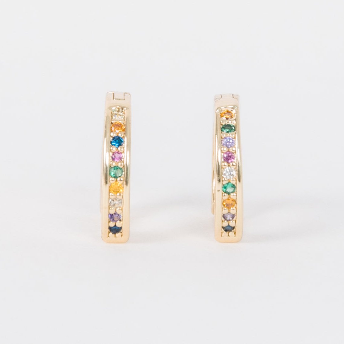 14k Gold Filled 12 mm huggie clasp Safe for sensitive skin Unique clasp has no post when earrings are closed, allowing for comfortable wear and sleep without having to remove earrings Multicolored bejeweld stones&nbsp;are 2 mm Perfect for mulitple piercings Freaking cute and freaking tiny