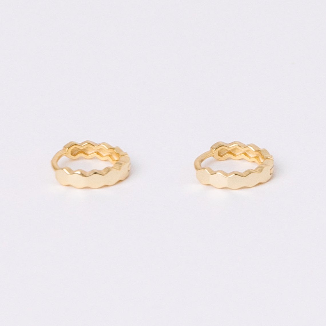 Crinkle Huggies. Gold Filled. Sterling Silver. You are able to sleep, shower, swim and LIVE in this jewelry. With the click in and click out closure, they stay closed, and don't poke your neck!