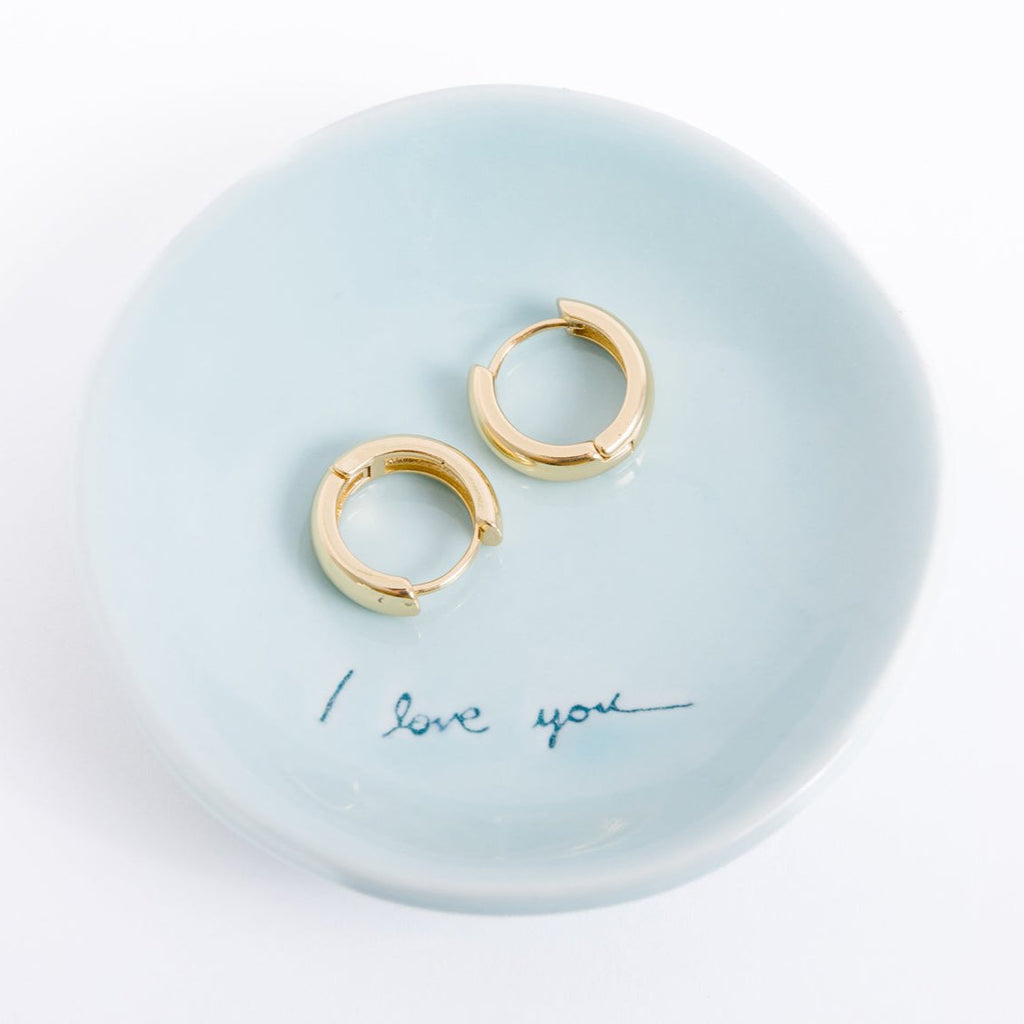 14k gold filled. Safe for sensitive skin. Unique clasp has no post when earrings are closed, allowing for comfortable wear and sleep without having to remove earrings. Available in 9 mm and 16 mm, Hypoallergenic, While gold filled is a strong, sturdy metal for maximum lifespan we don't recommend subjecting the earrings to lots of chemicals, waters, perfumes, etc.