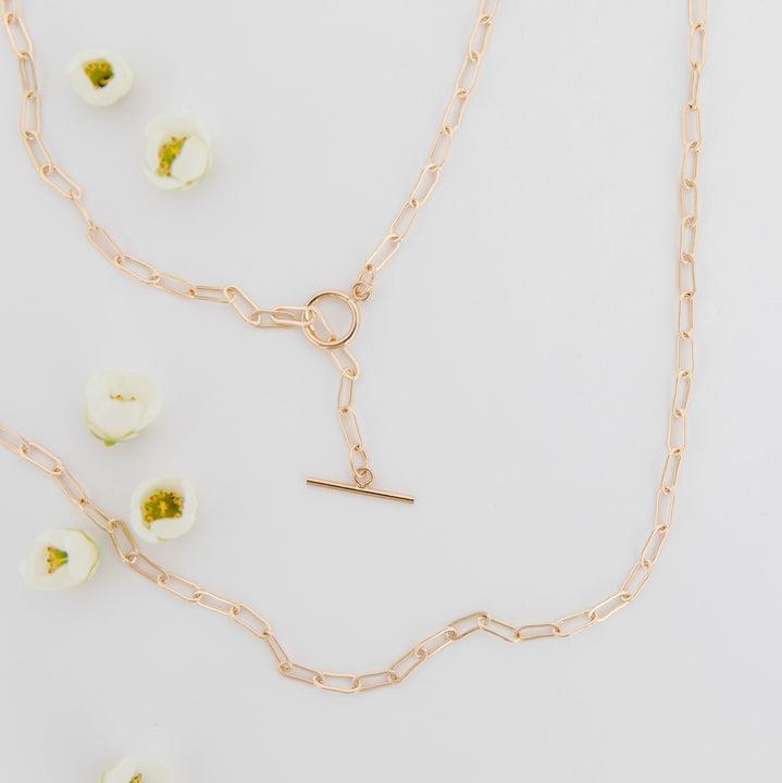 14k Gold Filled Chain. Available in 14, 15, 16, 18 or 20 inch chain (14 inch is a choker length, 18 inch is standard necklace length). Available with a traditional spring clasp that goes in the back, or a large front clasp.
