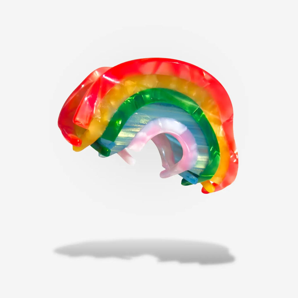 Show off your colors with this Rainbow Hair Claw! Featuring a stunning rainbow of colors, it's a fun way to keep your hair in place and brighten up your day! Just as small and thin as a regular hair claw, but way more vibrant and stylish! 🌈