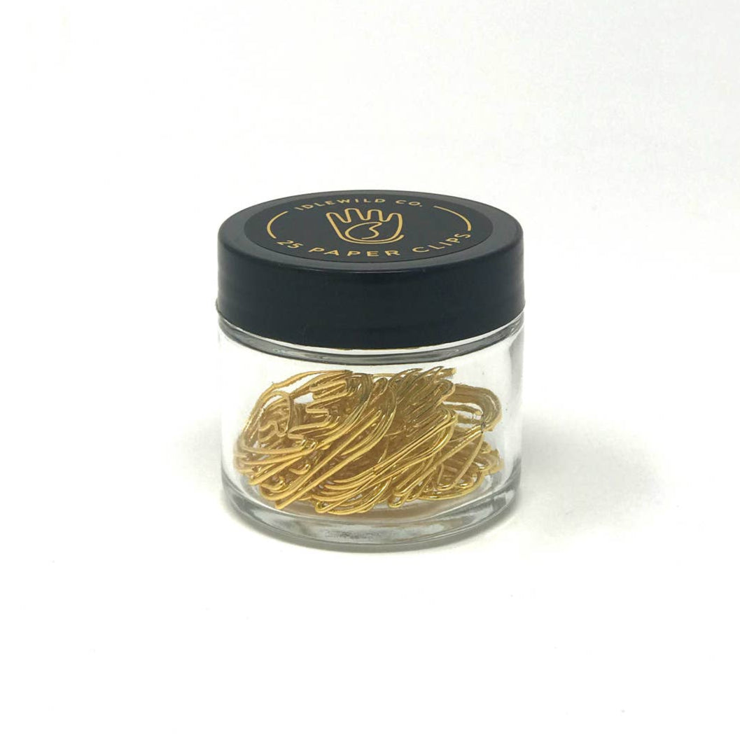 Our fun and quirky paper clips make all of your office &amp; school work just a bit more–if not exciting–than at least more aesthetically pleasing.

Small glass jars are filled with 25, 10k gold clips to dress up your desk, homework, bills, planners–anything you can think of!

• Glass Jar of 25-pieces

• Clips approximately .75" x 1"