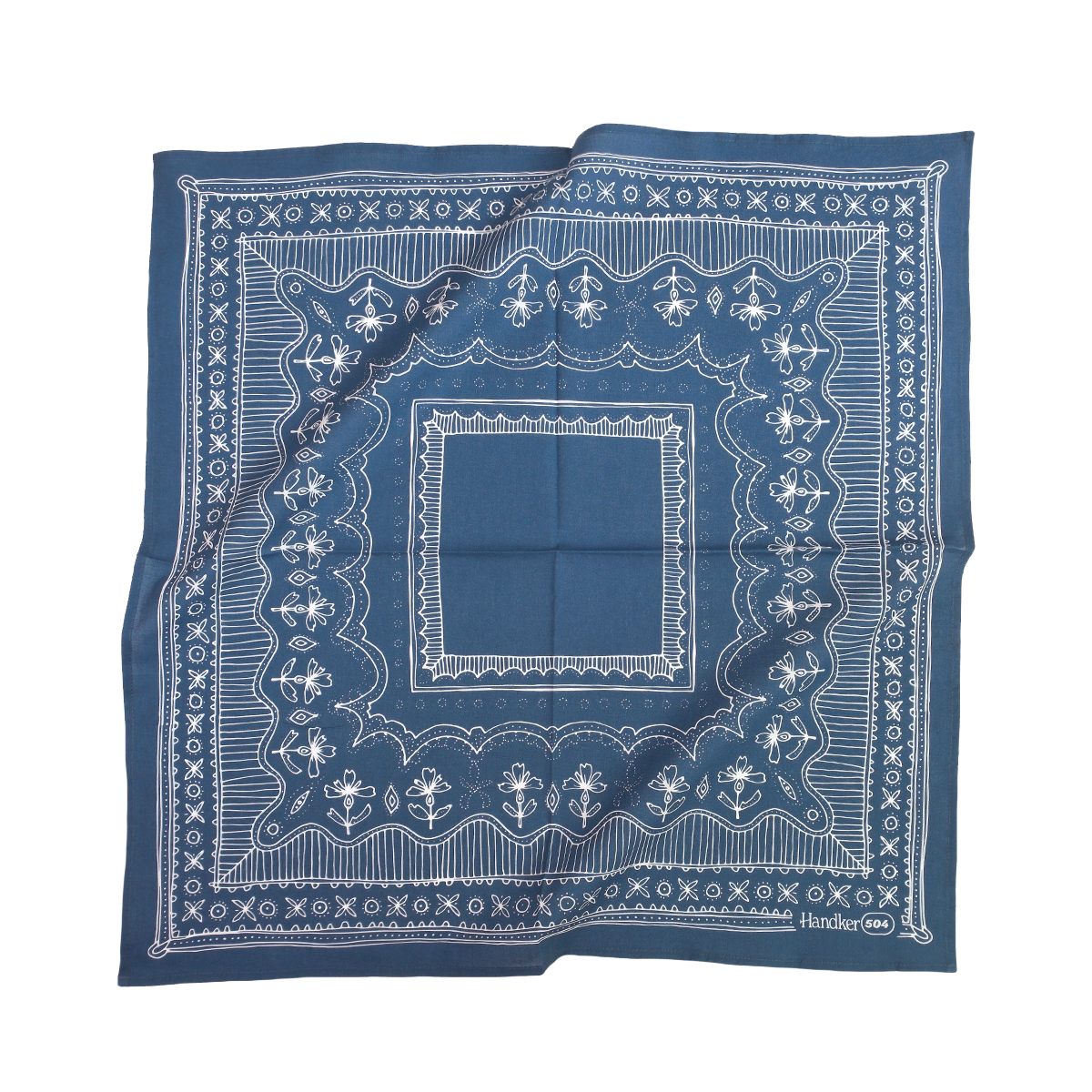 Blue bandana with white patterns on a white background