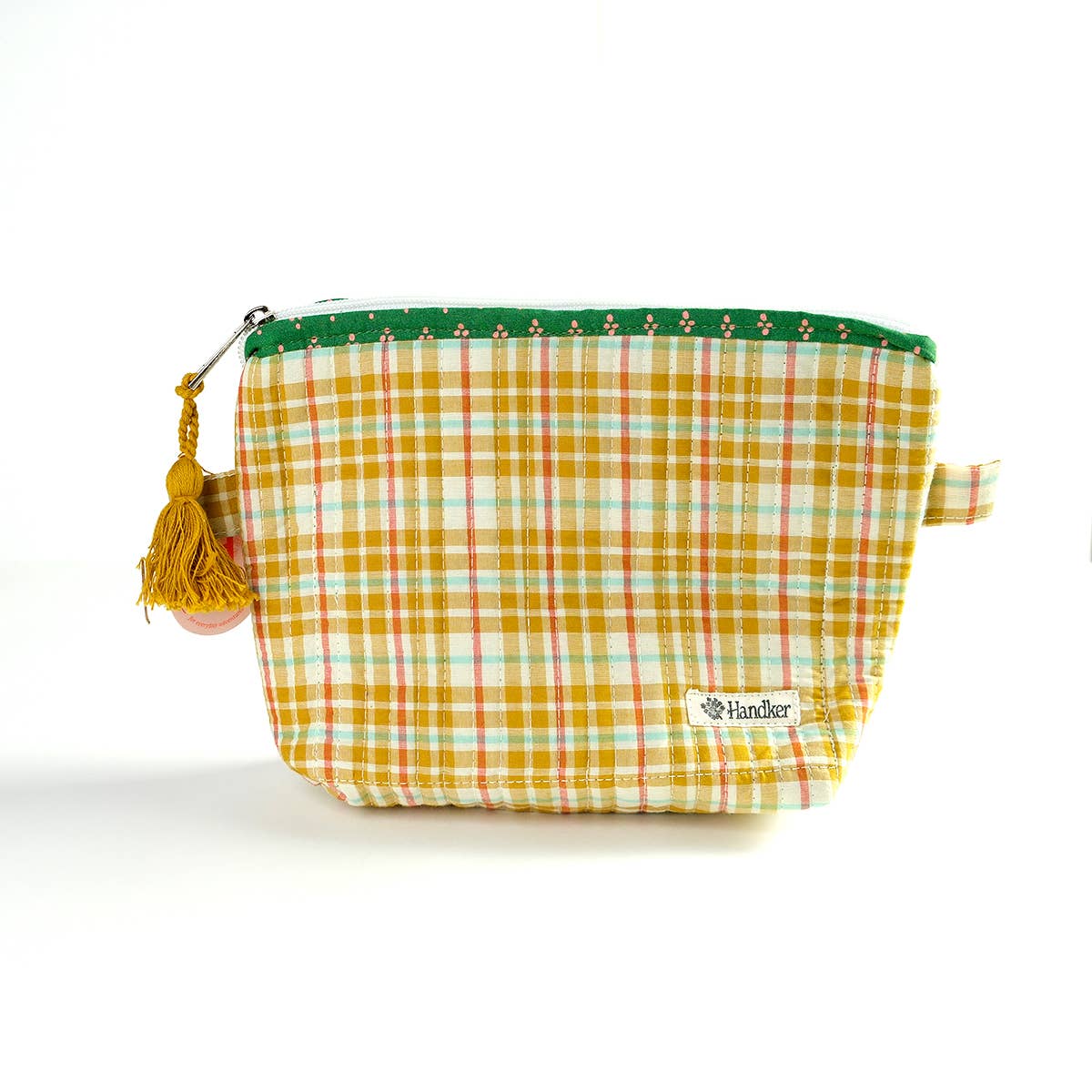 Yellow checkered pouch with a tassel on a white background