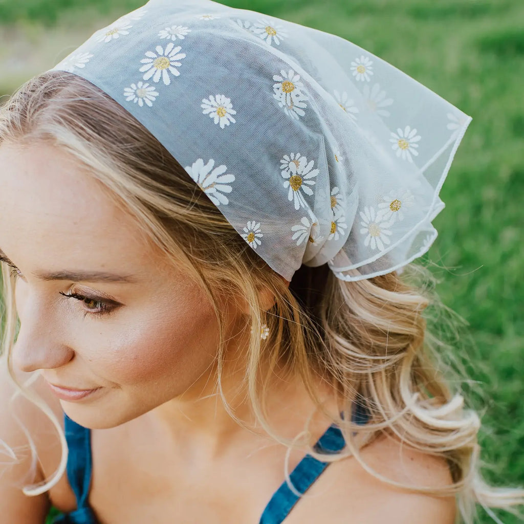 This Chiffon Bandana is the perfect soft-femme hair scarf that won't slide off your hair. This lightweight hair wrap is featured in a classic square design that can be traditionally styled or accessorized with a braid, bun, or bag.