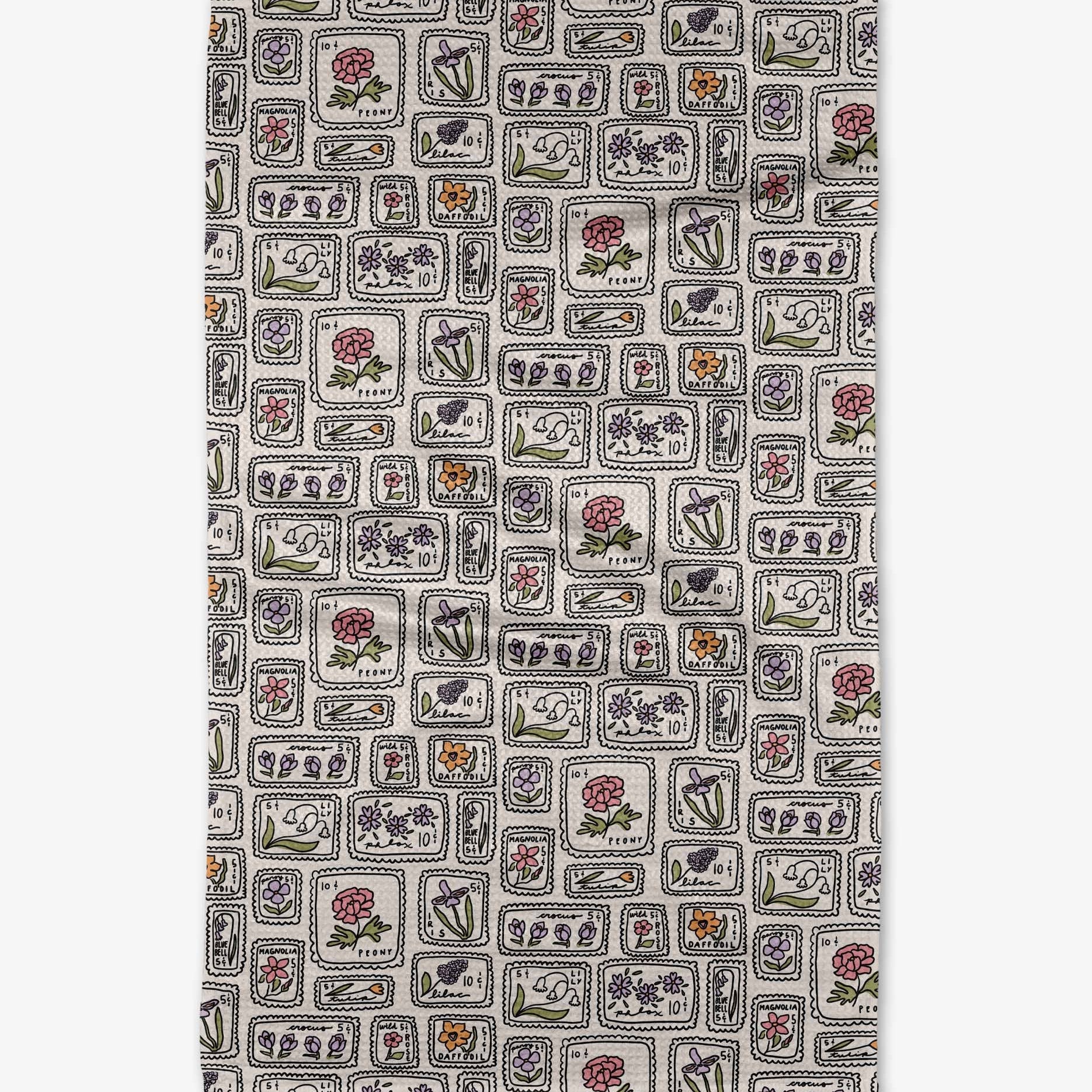 Patterned fabric with various stamp designs on a white background
