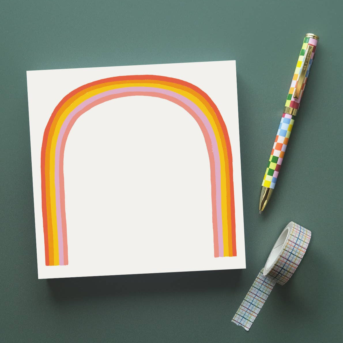 A fantasy-colored hand painted rainbow adorns a spacious writing sheet on this tear-off notepad. With 200 colorful, hand painted sheets, this jumbo notepad will go the distance! Keep your daily task list fanciful, or pen a message snail-mail style to brighten someone’s day.

• 200 TEAR-OFF SHEETS

• 6″ X 6″ notepad