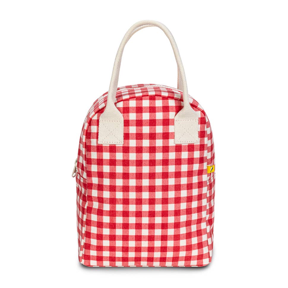 Certified organic cotton. Preshrunk and fully machine washable. Cotton canvas carry handles. Zipper closure. Rinse-able, tested food-safe lining. Interior pocket (for a water bottle or ice pack). Durable and roomy. Lunch bag is lined but not insulated. Water-resistant lining works well with an ice pack, if desired. Gingham Red pattern.