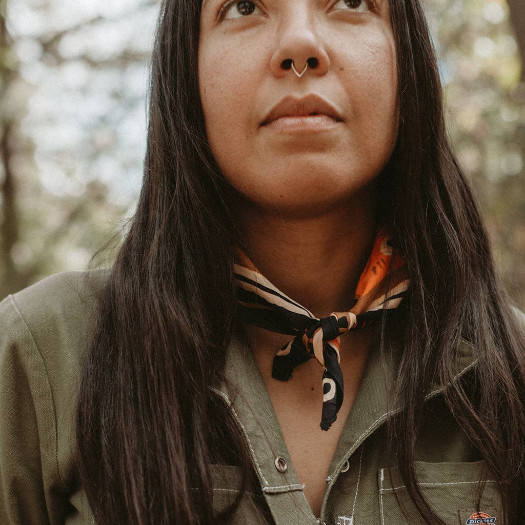 Unleash your wild side with "Wild Dwelling": the organic cotton bandana that's good for both you and the environment. Made with 100% certified organic cotton, this versatile bandana is perfect for accessorizing while reducing your carbon footprint. Embrace nature's style with "Wild Dwelling".