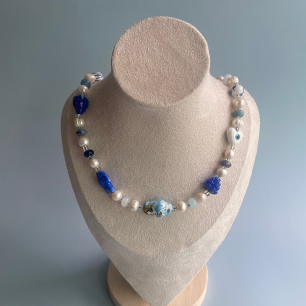 necklace with various blue beads and pearls