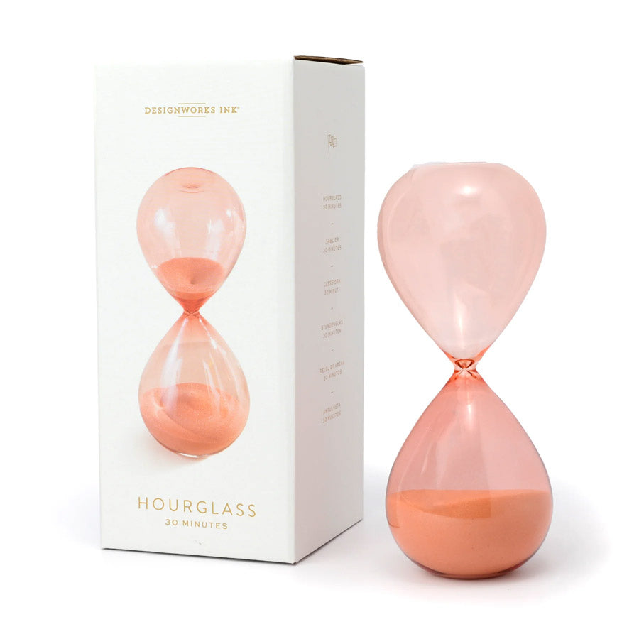 Beautiful peach glass hourglass with peachy-pink sand