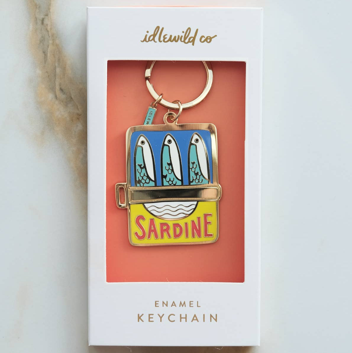 Our brass and enamel keychains make for an eye-catching accessory, perfect for finding those keys at the bottom of your bag! Created from our hand painted designs, they're fabricated with vibrant, hard-enamel and polished to a shine. We offer them in a pretty, plastic-free gift box, or opt in to our unboxed option for a reduced cost.

• Brass and Enamel Keychain

• Charm Measures Approx. 1.75 X 2″