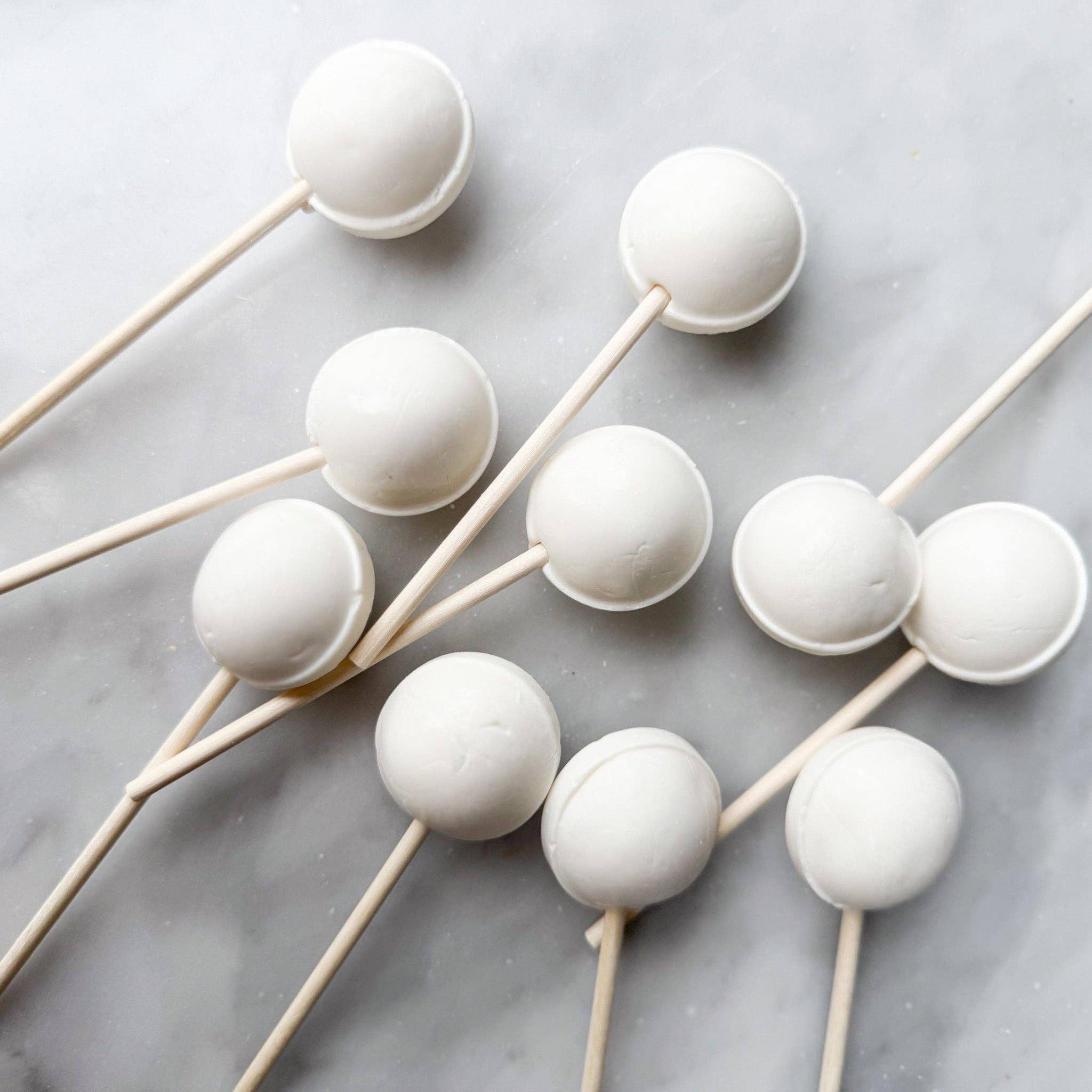 Our Marshmallow Fluff lollipop is a delightful candy that captures the beloved flavor of everyone's favorite squishy treat. This lollipop offers a rich, creamy taste that mimics the experience of indulging in fluffy marshmallows.

Details:

Made in the USA, our candy is all American candy—made in small batches by our talented candy makers
Ingredients: sugar, glucose, water less than 2% of citric acid, food coloring, artificial/natural flavoring, vegetable glycerin.