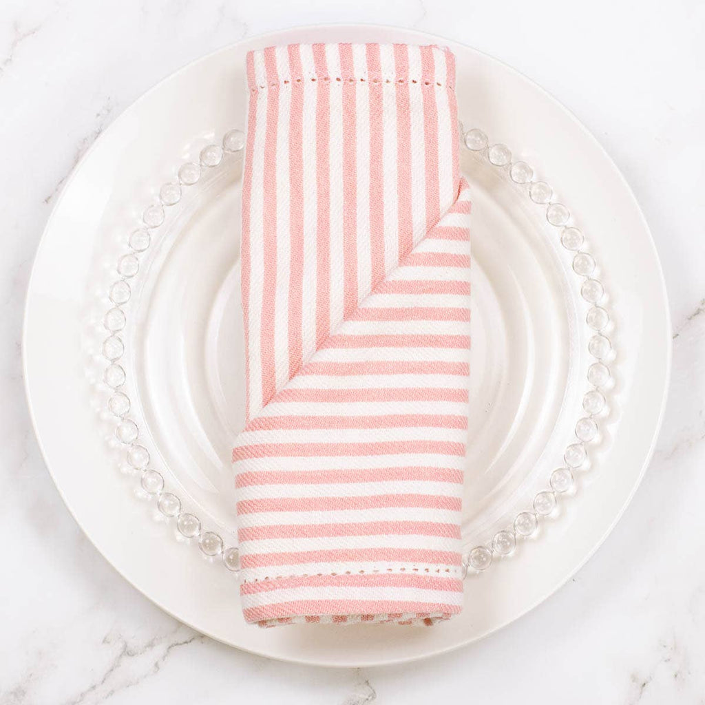 Add a touch of elegance to your dining experience with our Madison Stripe Napkin in Pink &amp; White. Made with high-quality materials, this napkin features a timeless stripe design that will elevate any table setting. Perfect for both casual and formal occasions, it's the perfect addition to your home.