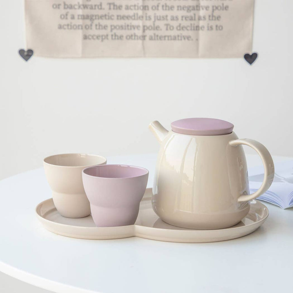 The tea set is available as a 4 piece deluxe porcelain tea set. This set features a simple all solid color design, with each piece made from porcelain. This set is sure to be a hit at your next family gathering, holiday, or just because.  All pieces are dishwasher and microwave safe.
