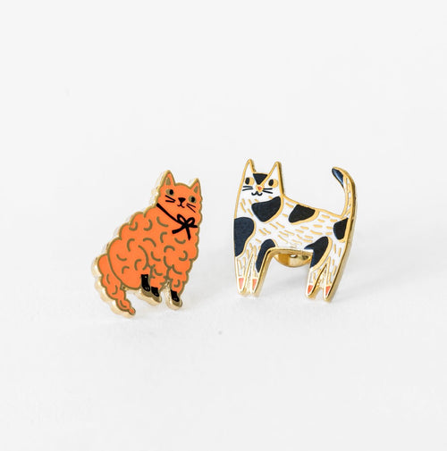 These unique earrings blend a sense of gold glamour with a charming twist. The mismatched yet perfectly paired .Cats