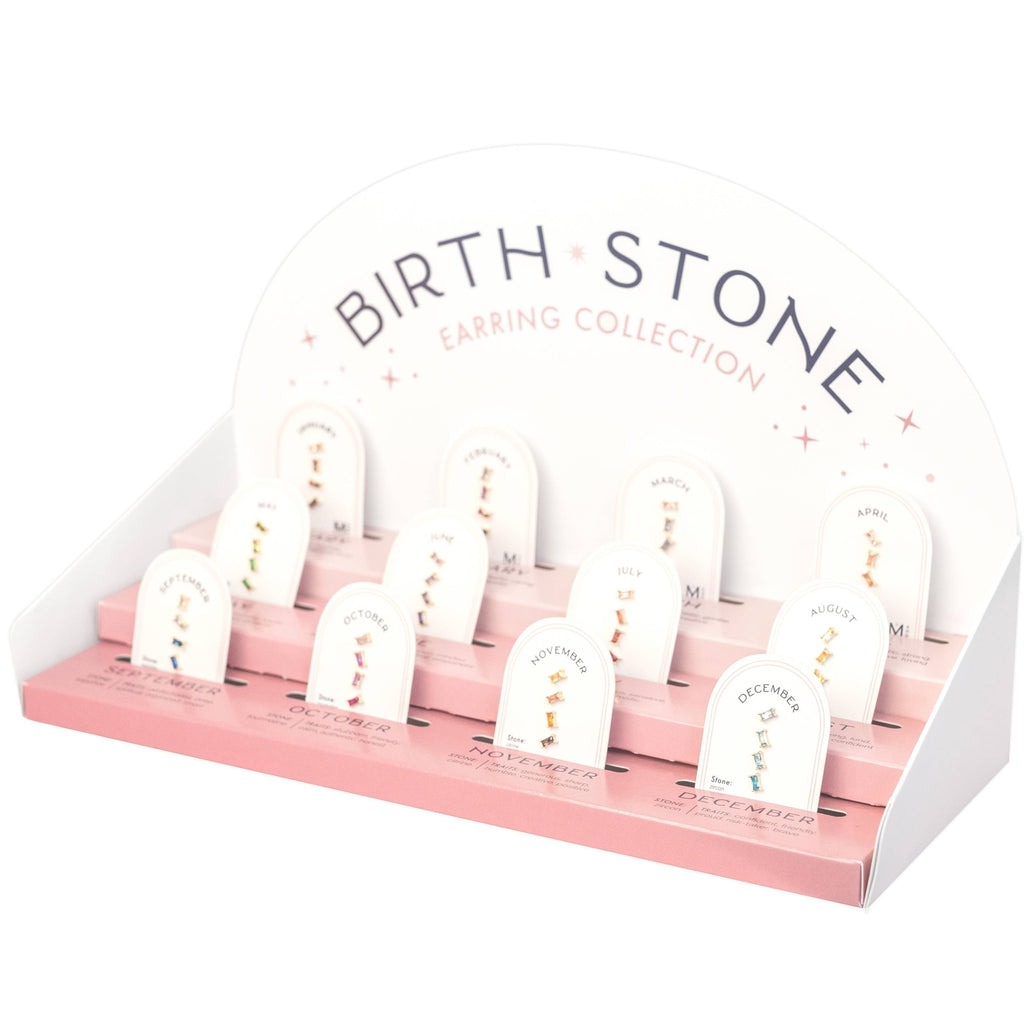  Birthstone Ombre Baguette Stud Earring Set, a collection of four stunning earrings crafted in 18k gold plated with an anti-tarnish coating. This set of stud earrings showcases the ombre effect, seamlessly blending hues from light to dark, creating a captivating visual representation of your birthstone's color spectrum. 