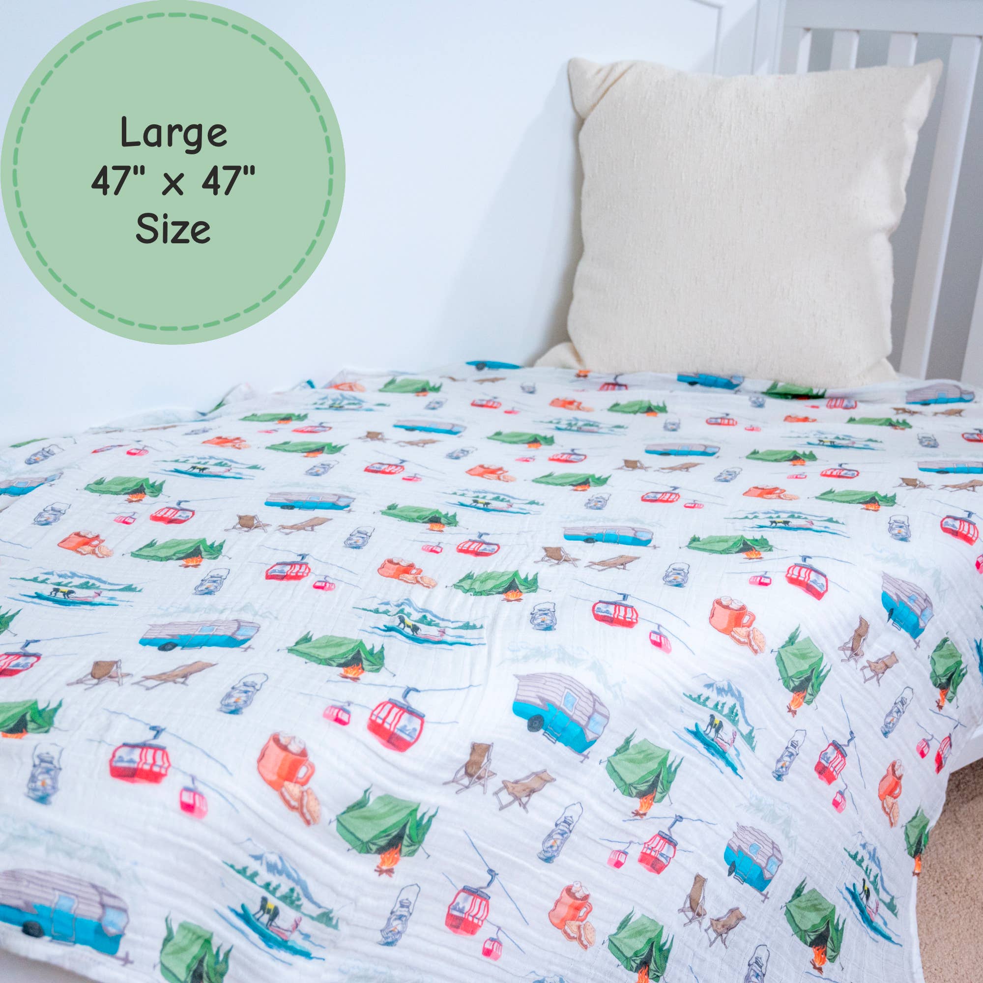 Children's bedding with vehicle pattern on a bed with a pillow.