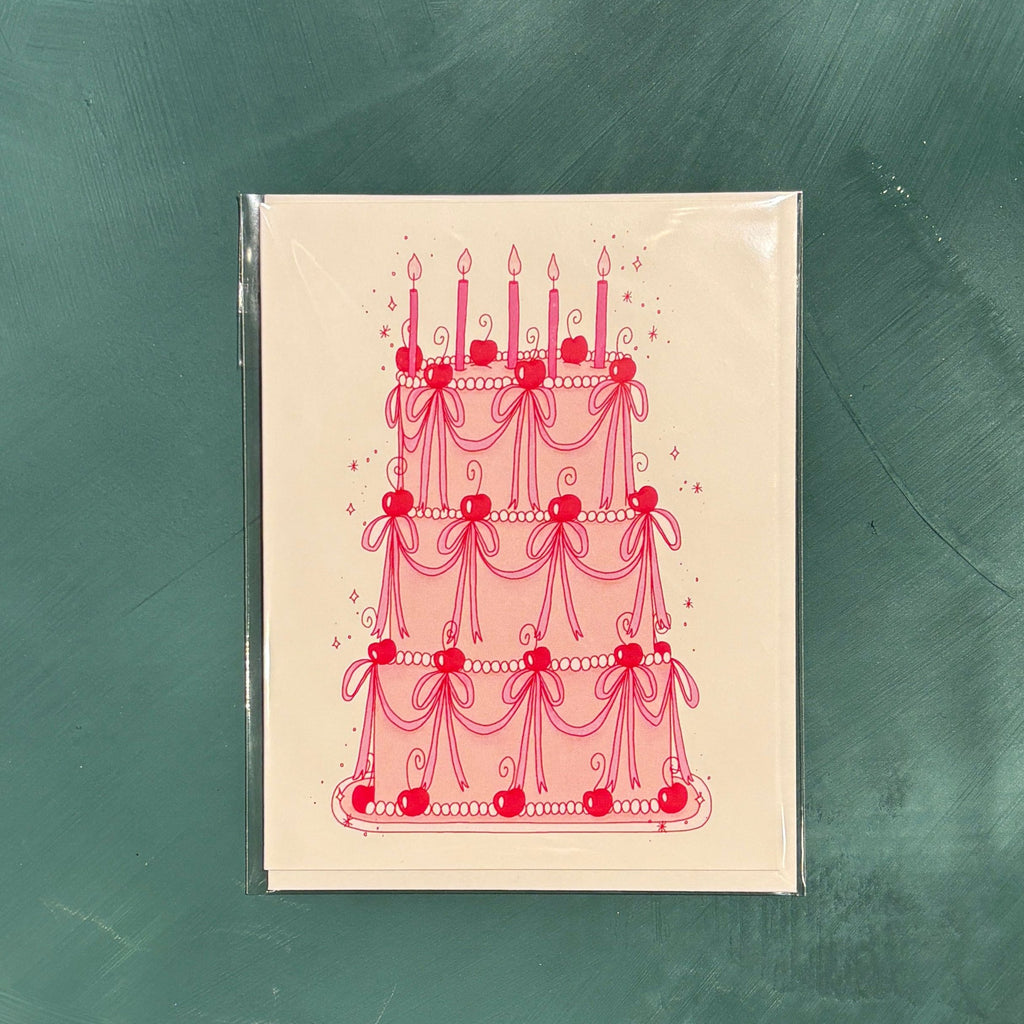 cream card with a vintage pink and red 3 layered cake