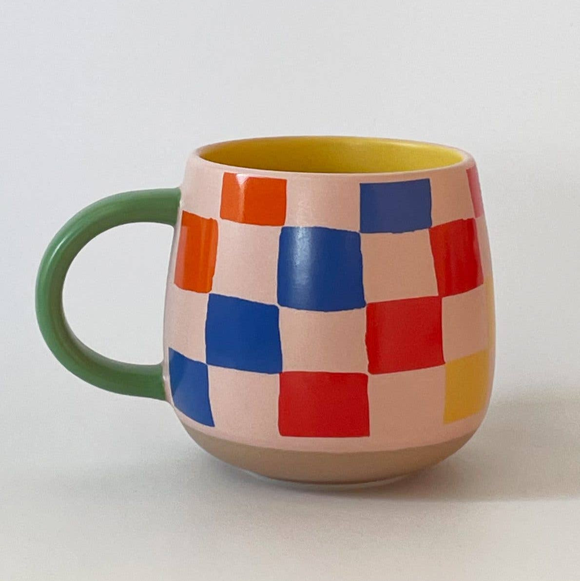 Our ceramic mugs feature our full-color, wraparound graphics on a single-walled ceramic base. We designed our vessel to be bowl shaped, keeping your drinks warm til the last drop! Coordinating handle and interior glazing keeps these as fun as they are functional- the perfect ray of sunshine to brighten your kitchen. Packaged in a pretty gift box, these make a delightful hostess or housewarming gift.

• 13.5OZ | 400ML

• 13.5OZ | 400ML

• Dishwasher safe/Microwave Safe - Hand Wash For Maximum Longevity&nbsp;