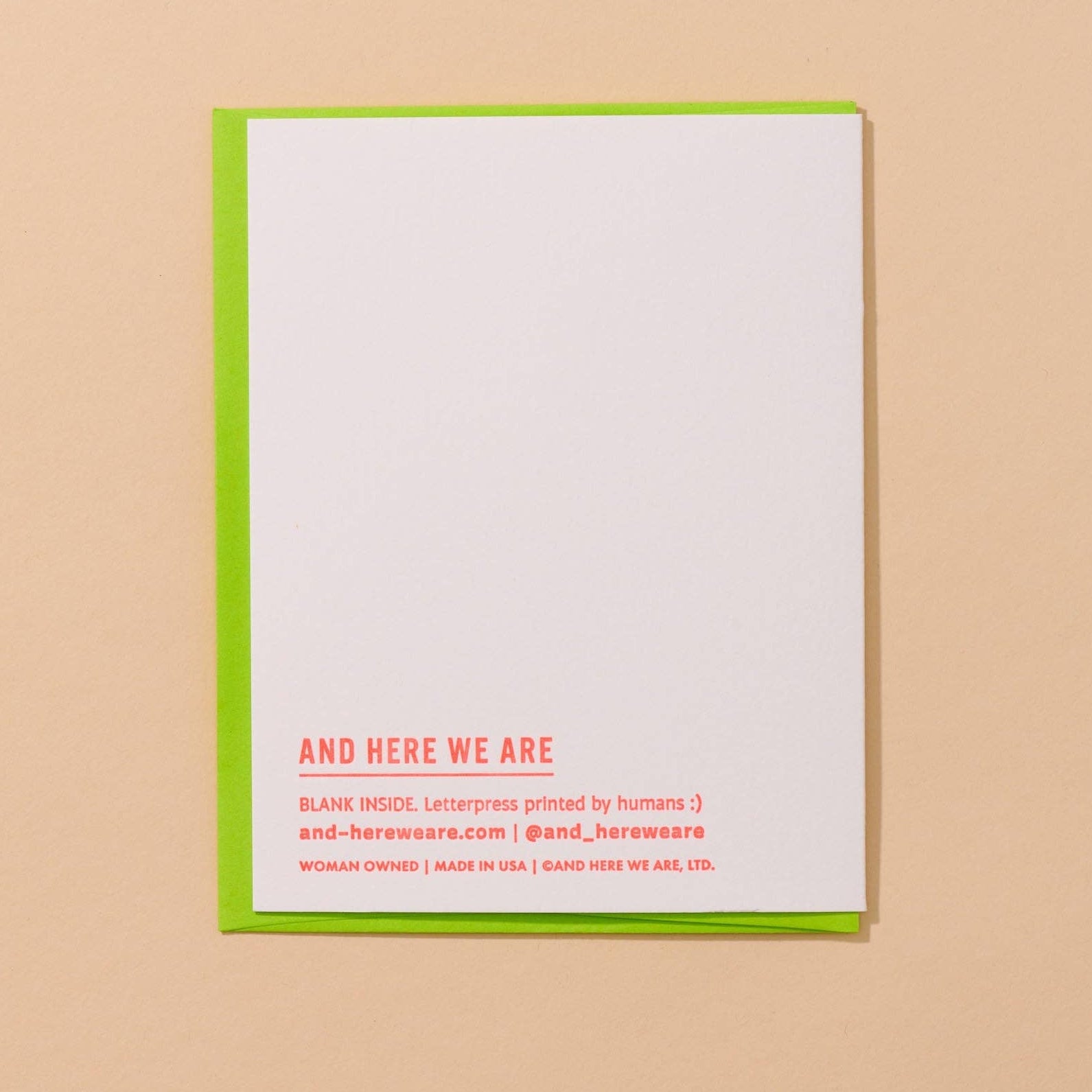 White card with red text on a beige background