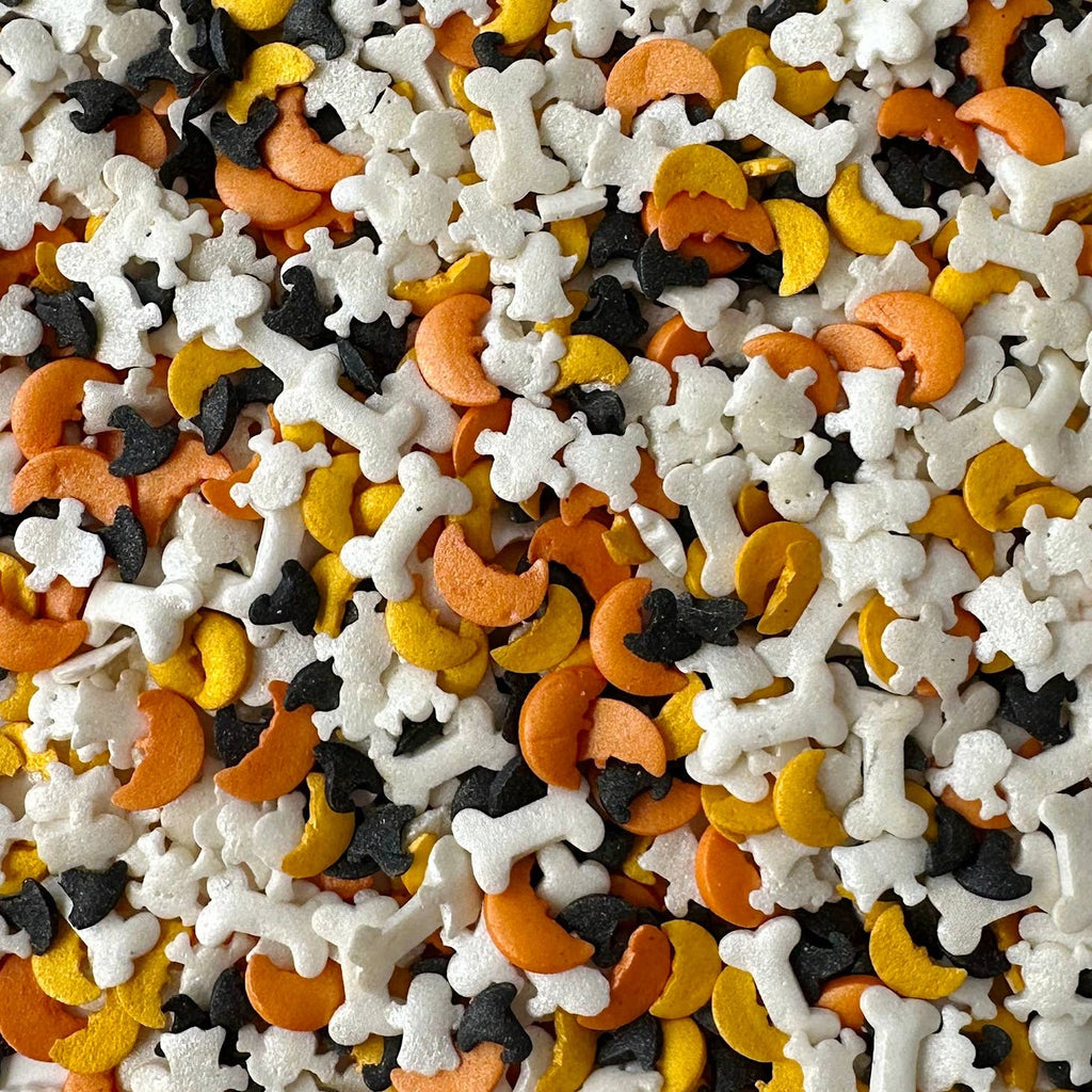 Trick or treat yourself to some Halloween Confetti! Filled with all your favourite Halloween shapes - this Halloween Confetti is the perfect finishing touch to any sweet treat this spooky season! Perfect for embellishing anything from a haunted treat to birthday cupcakes, and everything in between!  Contains  Sugar, Sunflower oil, Potato starch, Rice flour, Potassium aluminium silicate, Shellac, Artificial colors (Titanium dioxide, Carbon black, Riboflavin, Iron oxide, Cochineal). Size  4oz Bottle