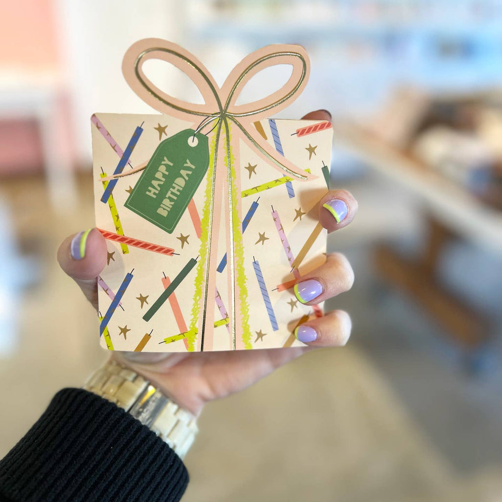 A fun and colorful die-cut folded greeting card and coordinating envelope to wish a very Happy Birthday!




4.25 x 5.5 inches when folded

Gold foil accents

Blank interior 
