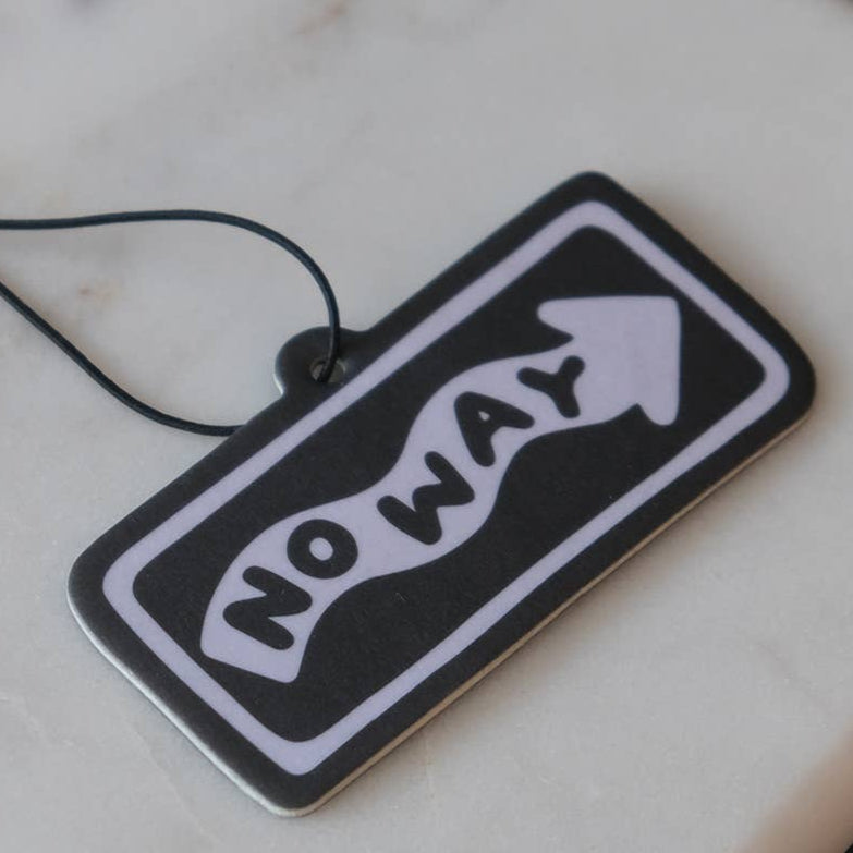 Black and white 'NO WAY' sign pendant on a marble surface