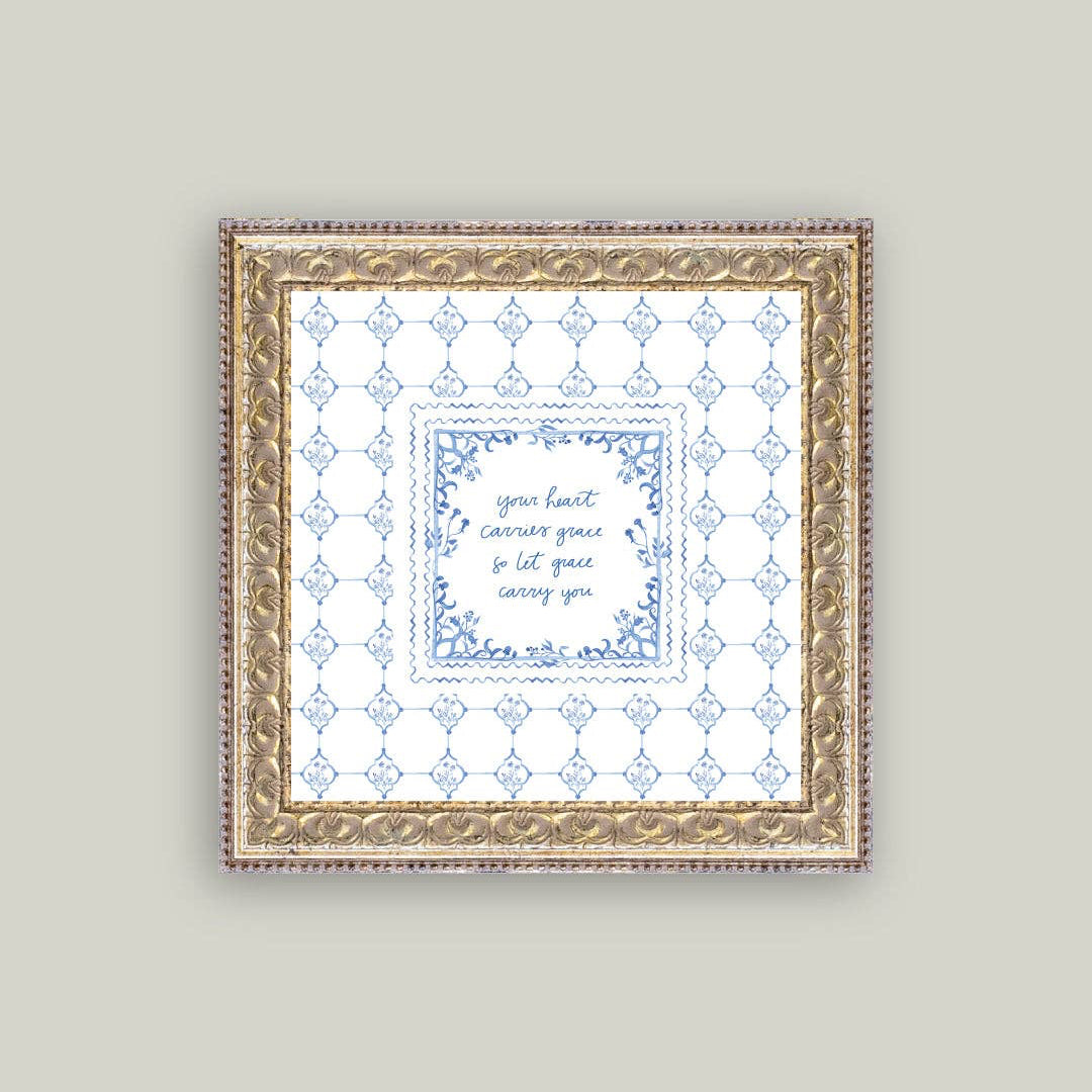 Embrace a moment of daily inspiration with this charming 9x9 framed art piece. Featuring the uplifting message "Your heart carries grace so let grace carry you," it combines a serene blue background with an ornate vintage-style frame that brings timeless elegance to any room. Perfect for bedside tables, office spaces, or as a thoughtful gift, this piece serves as a gentle reminder to extend compassion to yourself and others.
