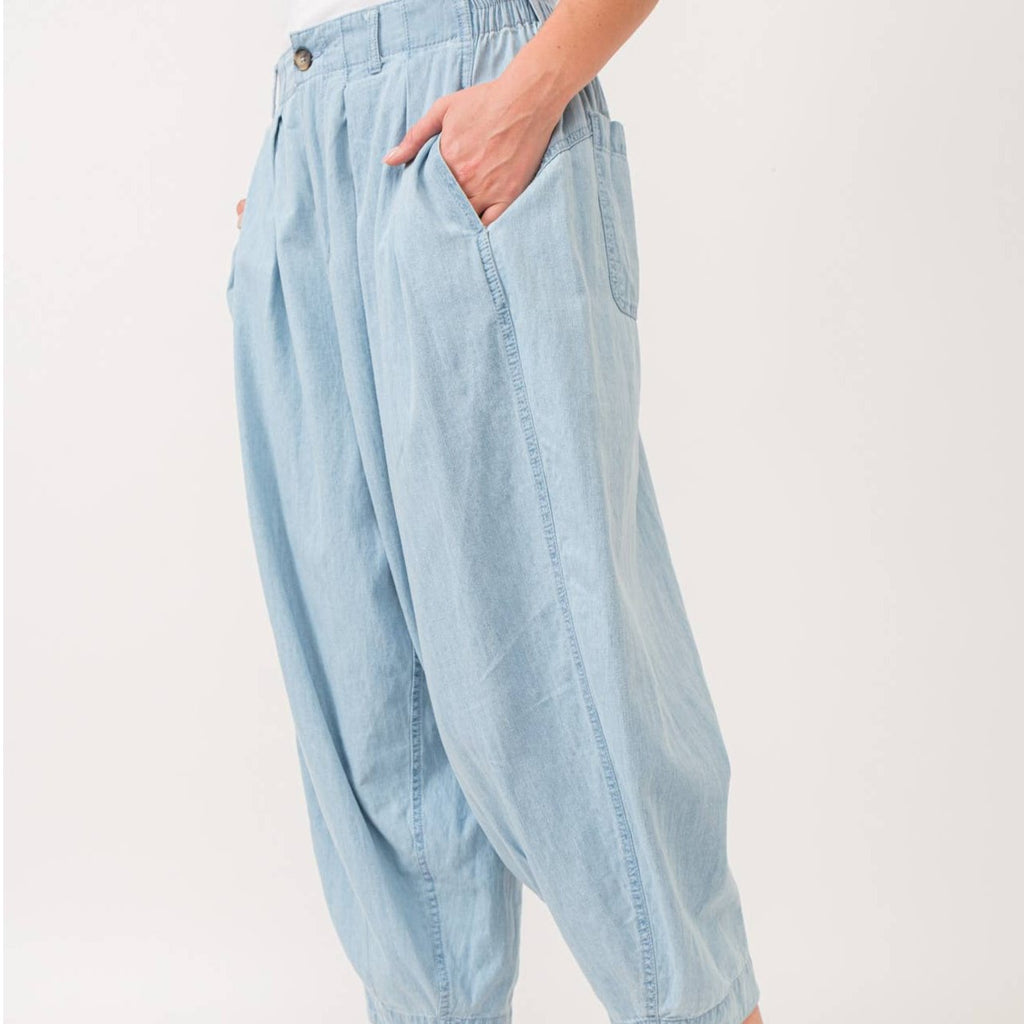Quinn Pants are crafted from lightweight denim, offering a relaxed fit with a pleated front detail for added flair. The elastic back waist ensures comfort without compromising style.&nbsp;