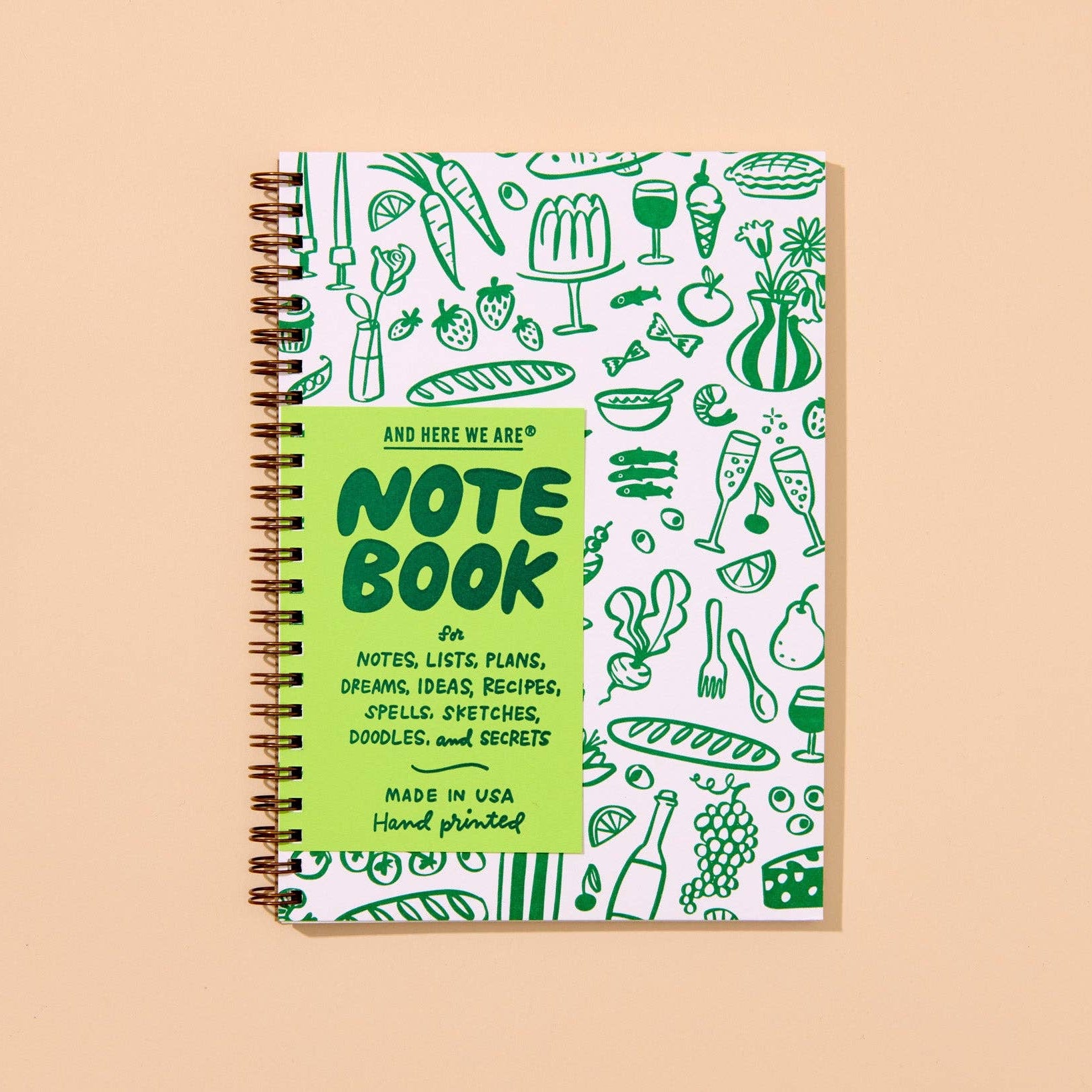 nspired by mid-century dinner parties, this modern letterpress A5 spiral-bound notebook features line art icons of food and home. 48 lined pages, hand printed and assembled in Columbus, Ohio, USA.

Details:

Spiral bound notebook with gold colored coil
A5 size (5.8” x 8.25”)