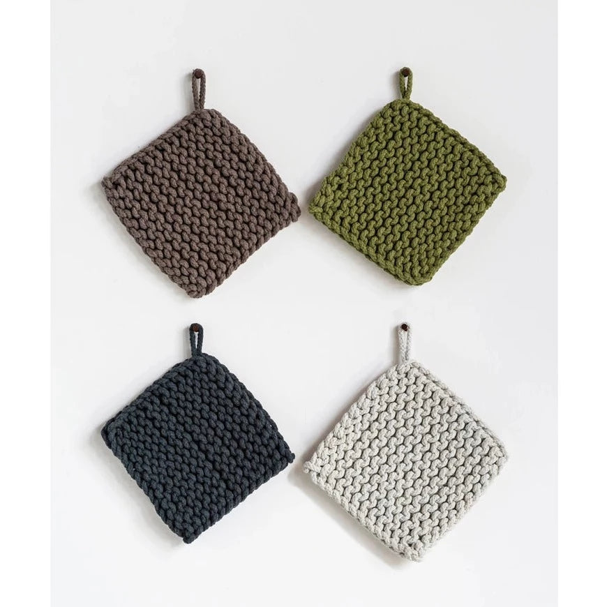    Make your kitchen look marvelous while keeping your hands safe from hot pots and pans with this cute cotton crocheted pot holder! Choose your favorite color (it comes in four different colors!) and add a pinch of quirkiness to your cooking experience. Who says pot holders can't be stylish? Color  Dark Tan  Green  Charcoal Grey  Cream