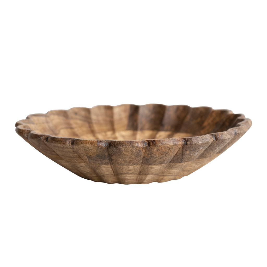 This Scandinavian-inspired bowl showcases a fluted, solid wood silhouette with a scalloped edge.&nbsp;

This piece is food safe. Hand wash only.&nbsp;

Made from mango wood.