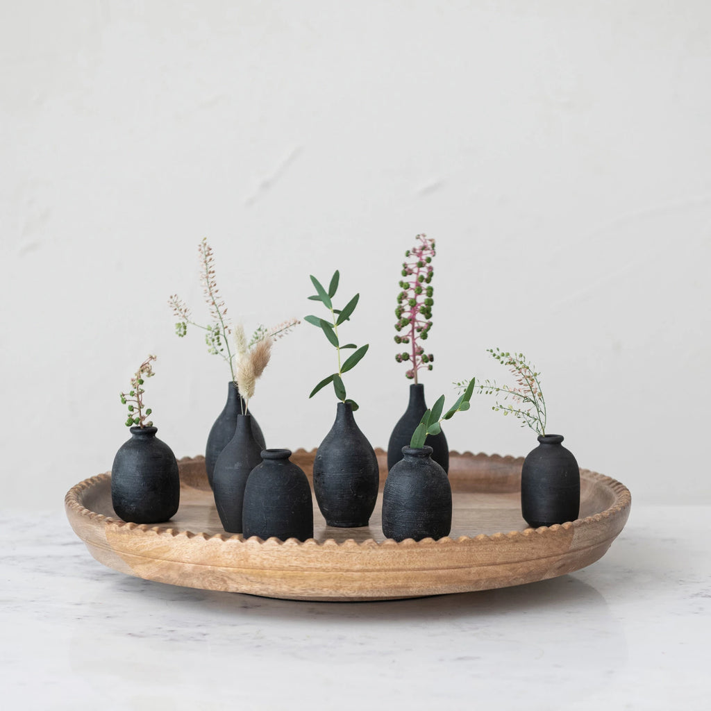 Spruce up your home decor with our Decorative Handmade Terra-cotta Mini Vase. The unique black chalkboard finish adds a touch of whimsy and doubles as a creative way to label your mini plants. Handmade with terra-cotta, each vase is one-of-a-kind. 