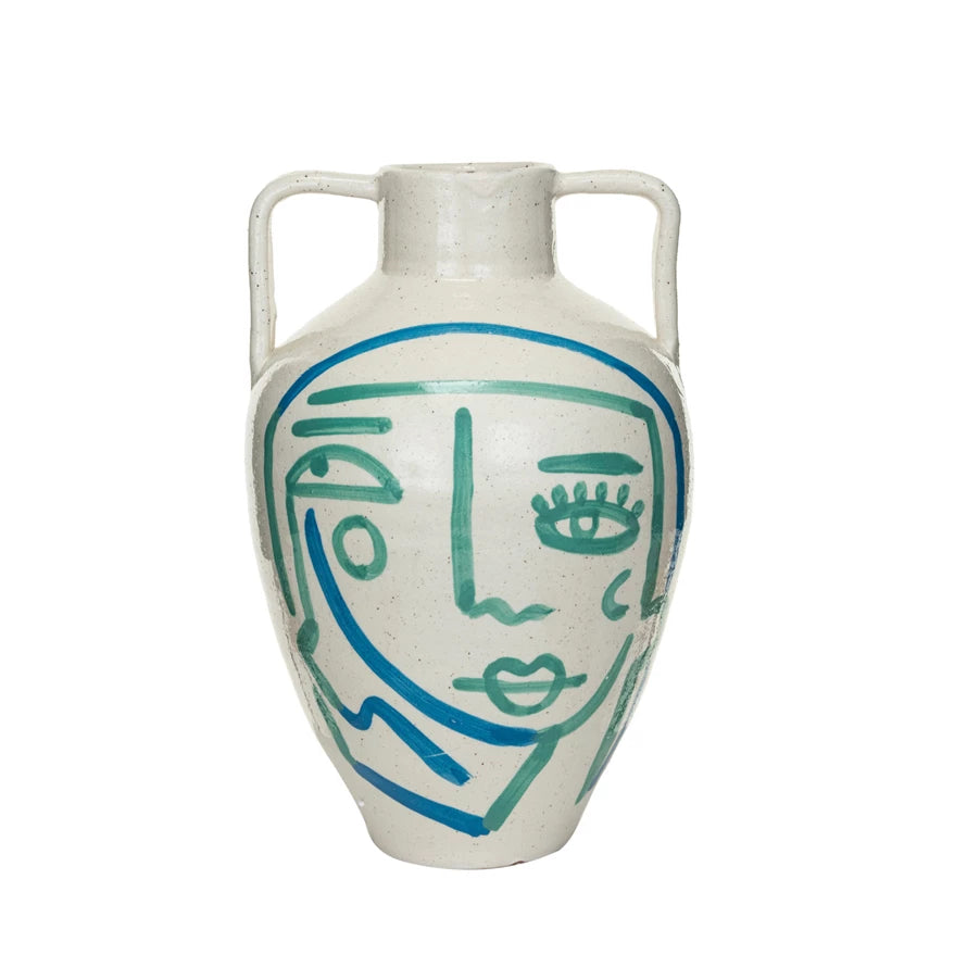 This hand-painted terra-cotta vase features an abstract face and crackle glaze in white, blue, and aqua colors. It is a unique and beautiful home accessory, made of baked clay with a porous and earthy texture. The vase has a round shape and wide opening, and its hand-painted design adds a playful and artistic touch. The crackle glaze creates a glossy surface, while the white, blue, and aqua color scheme adds a cozy and elegant look. 9-3/4"L x 9-1/2"W x 15"H