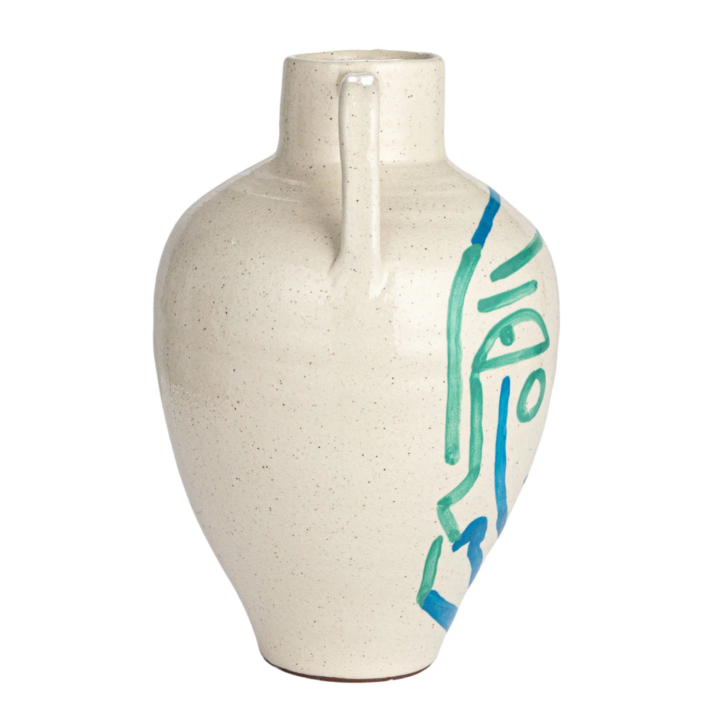 This hand-painted terra-cotta vase features an abstract face and crackle glaze in white, blue, and aqua colors. It is a unique and beautiful home accessory, made of baked clay with a porous and earthy texture. The vase has a round shape and wide opening, and its hand-painted design adds a playful and artistic touch. The crackle glaze creates a glossy surface, while the white, blue, and aqua color scheme adds a cozy and elegant look.