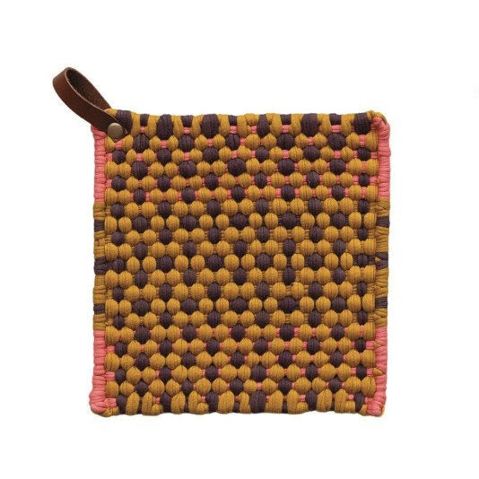 This square cotton crocheted pot holder with a leather loop is a cozy and rustic addition to the home or office kitchen. It features a square shape and a cotton crocheted design providing protection from hot pots and pans. The holder's leather loop allows easy storage and access. Made of high-quality cotton, it is soft, durable, and machine-washable. Suitable for handling hot casseroles, soups, and fresh pie. This versatile pot holder is perfect for cooking and baking, making it a perfect companion for the 