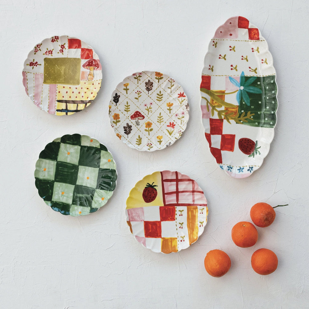 Add a pop of color to your kitchen with our Hand-Painted Stoneware Scalloped Plate! With a unique pattern and scalloped design, it's sure to liven up any meal. Made with high-quality stoneware, it's durable and perfect for everyday use. Upgrade your dining experience now!&nbsp;Colorful Flowers
