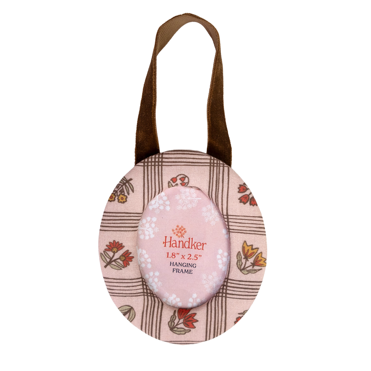 A round fabric hanging frame with a light pink floral print, brown plaid lines, and a brown fabric handle. A pink oval insert in the center reads 'Handker 1.