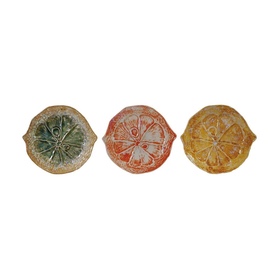 Brighten up your table with our Stoneware Citrus Shaped Plate! Available in 3 vibrant colors, this playful and quirky plate will bring a pop of fun to any meal. Made from durable stoneware, it's perfect for serving up all your favorite dishes. Add a slice of happiness to your dining experience today! 6-3/4"L x 6"W