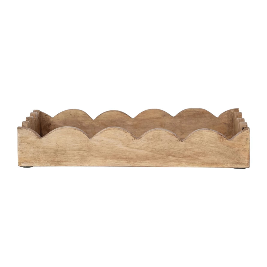 Introducing our Mango Wood Scalloped Tray, the perfect addition to your home decor! Crafted from sustainable mango wood, this unique tray features a delightful scalloped edge design. Use it to serve your favorite dishes or as a decorative centerpiece. A charming touch to any room!